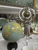 An orbit globe and a late 20th century g
