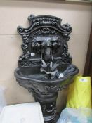 A garden elephant water fountain