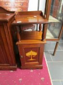 An Art Nouveau inlaid pot cupboard