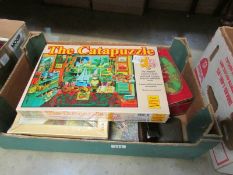 2 boxes of jigsaw puzzles etc