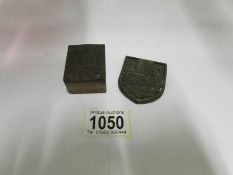 A copper printing block and a brass cres