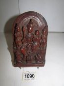 A well carved wooden Eastern religious w