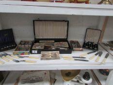 A mixed lot of cutlery, vanity set etc