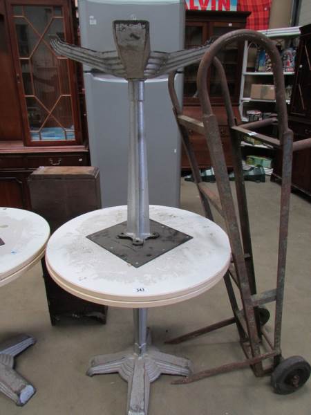 A pair of metal based tables