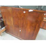 A mahogany veneered bookcase/cabinet