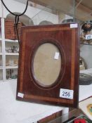 A mahogany inlaid photo frame