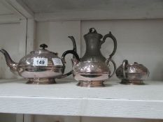 A silver plate tea service and a pewter