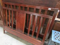 A mahogany bedstead with side rails