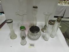 9 assorted glass bottles and vases with