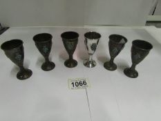 A set of 6 small silver goblets with tur