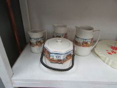 A set of 3 graduated jugs with coaching