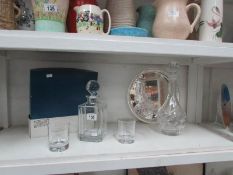 A decanter and 2 glasses set, another de