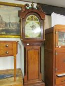 An oak and mahogany long case clock with