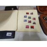 4 albums of world stamps and 2 albums of