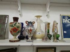 A mixed lot of glass and ceramic vases,
