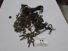 A mixed lot of watch chains and keys