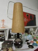 A 1950's German pottery lamp with origin
