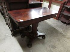 A rosewood veneered hall table