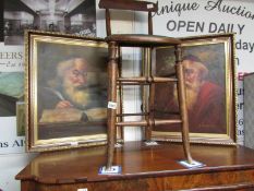A pair of gilt framed portraits of old g