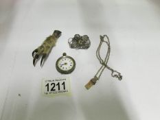 A silver fob watch a/f, a claw brooch, f