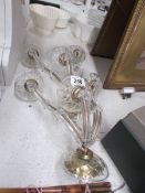 A pair of glass 3 lamp wall lights