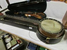 A cased banjo