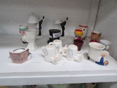 A quantity of novelty cruets, egg cups e