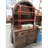 An oak arched top dresser