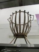 A metal log basket