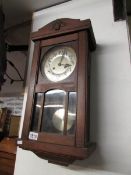 An oak wall clock