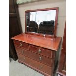 A mahogany inlaid dressing table