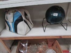 A ladies bowling ball by Brunswick with
