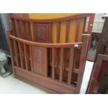 A carved bedstead