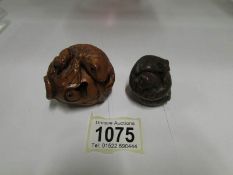 A Snake and frog netsuke with mother of