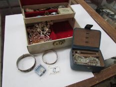 A mixed lot of costume jewellery including silver bangle and earrings