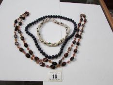 A mixed lot of necklaces including lapis lazuli,