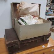 A case and a box of vintage Christmas decorations