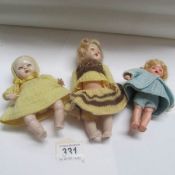 3 small vintage dolls