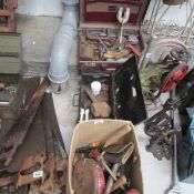 A tin tool box and contents,