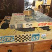 A boxed Scalextric GT speed set 69 and an Airfix motor racing set,