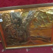 A framed picture in copper initialled M K