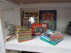 A quantity of Thomas the Tank Engine books including boxed The Railway series set and Ladybird