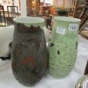 A pair of early Chinese vases (overlay a/f)