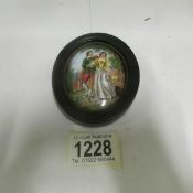 An oval miniature painting on porcelain