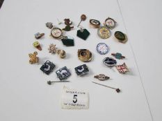 A pair of silver malachite earrings and a mixed lot of badges