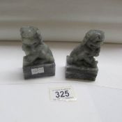 A pair of soapstone Dogs of Foo