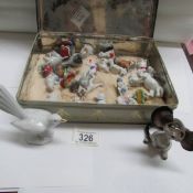 A quantity of  small animal figures including Wade and Disney