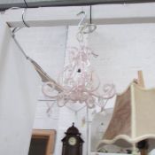 A small pink hall chandelier