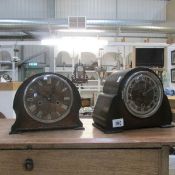 A striking clock and a chiming clock with keys and pendelum