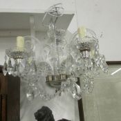 A 5 lamp glass chandelier